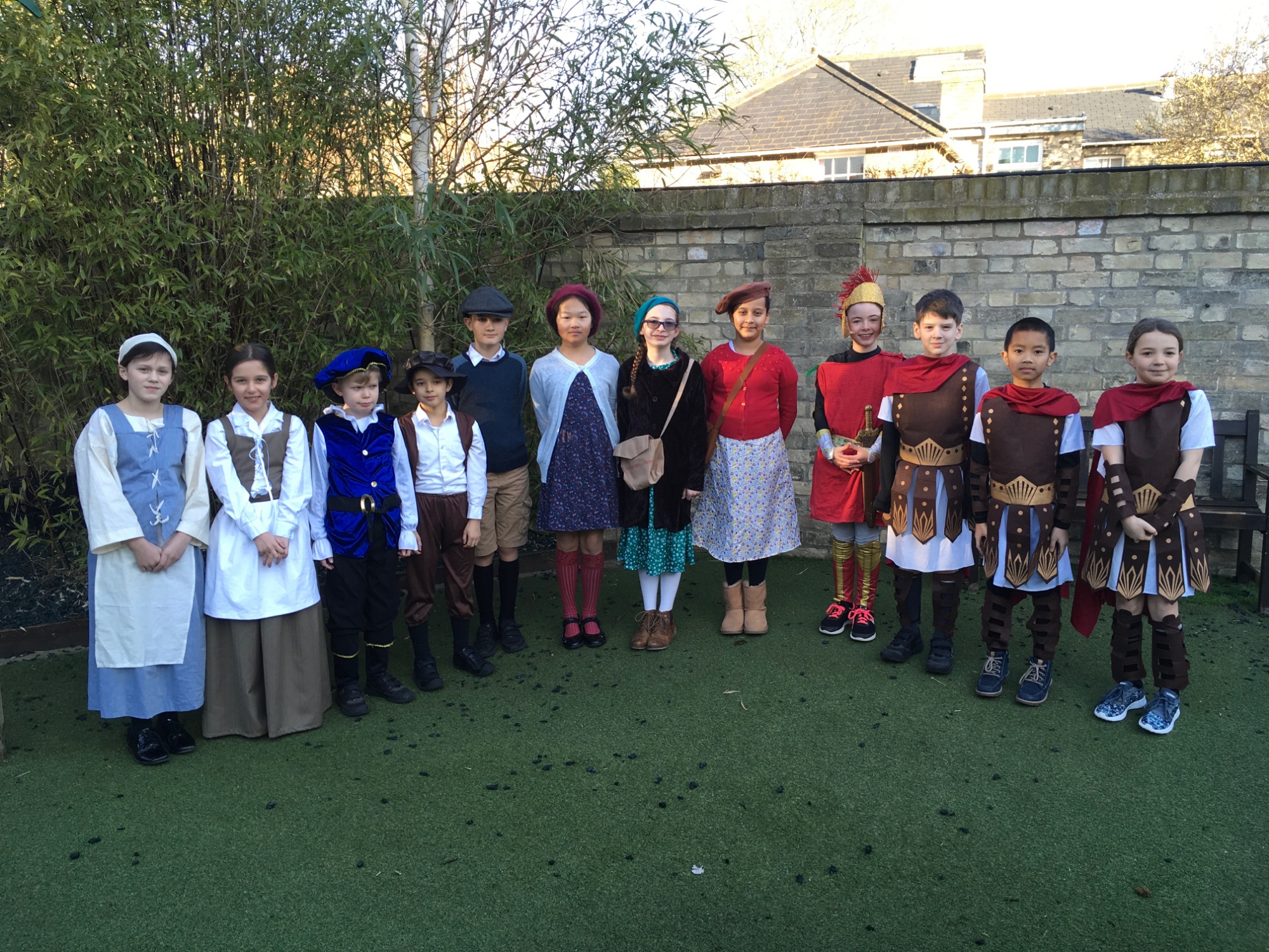 Students in Roman, Tudor and WW2 costumes