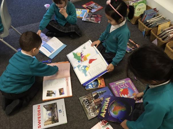 Pre-Prep pupils learn about new places in atlases