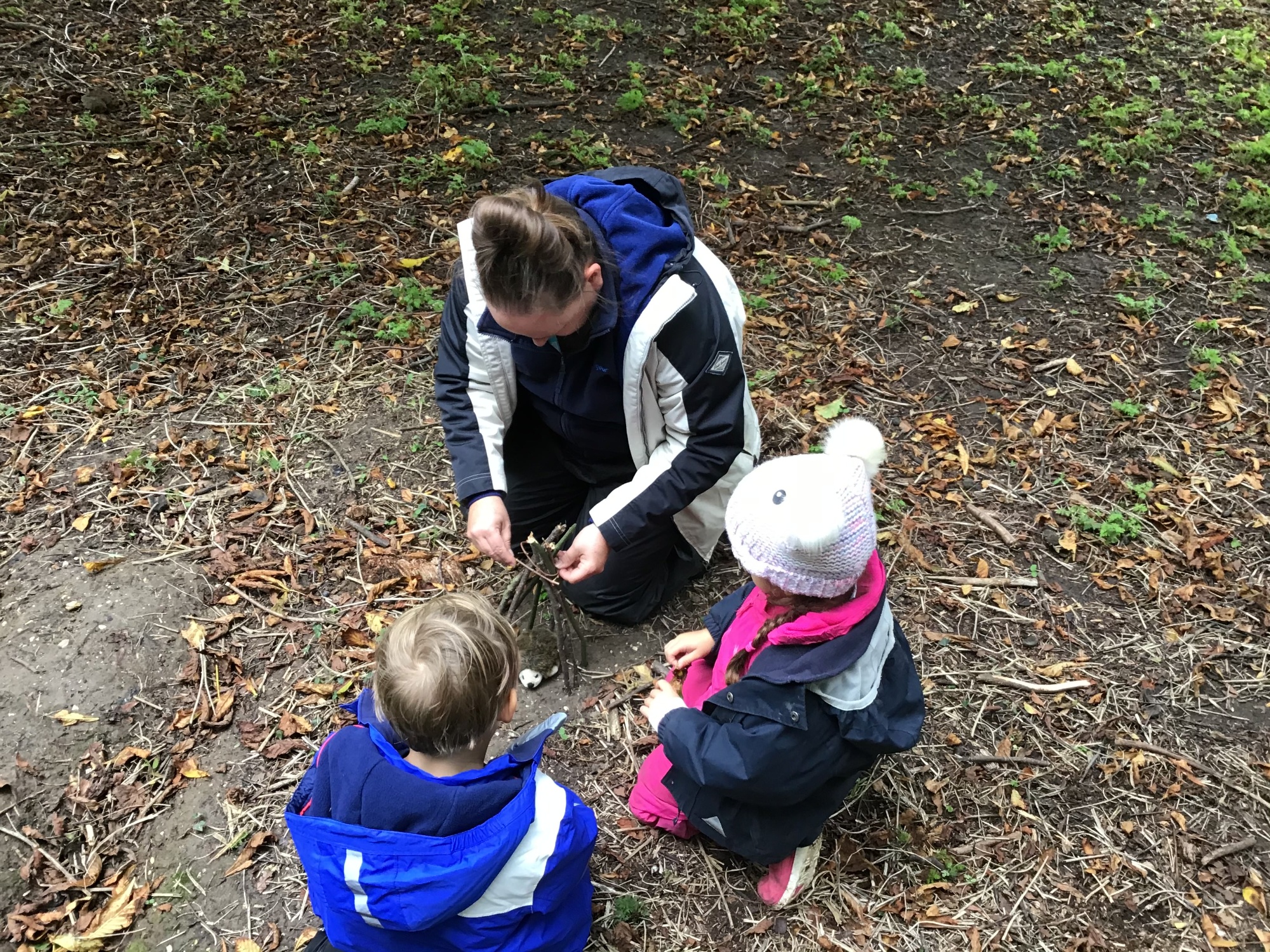 Learning how to make animal shelters at forest school