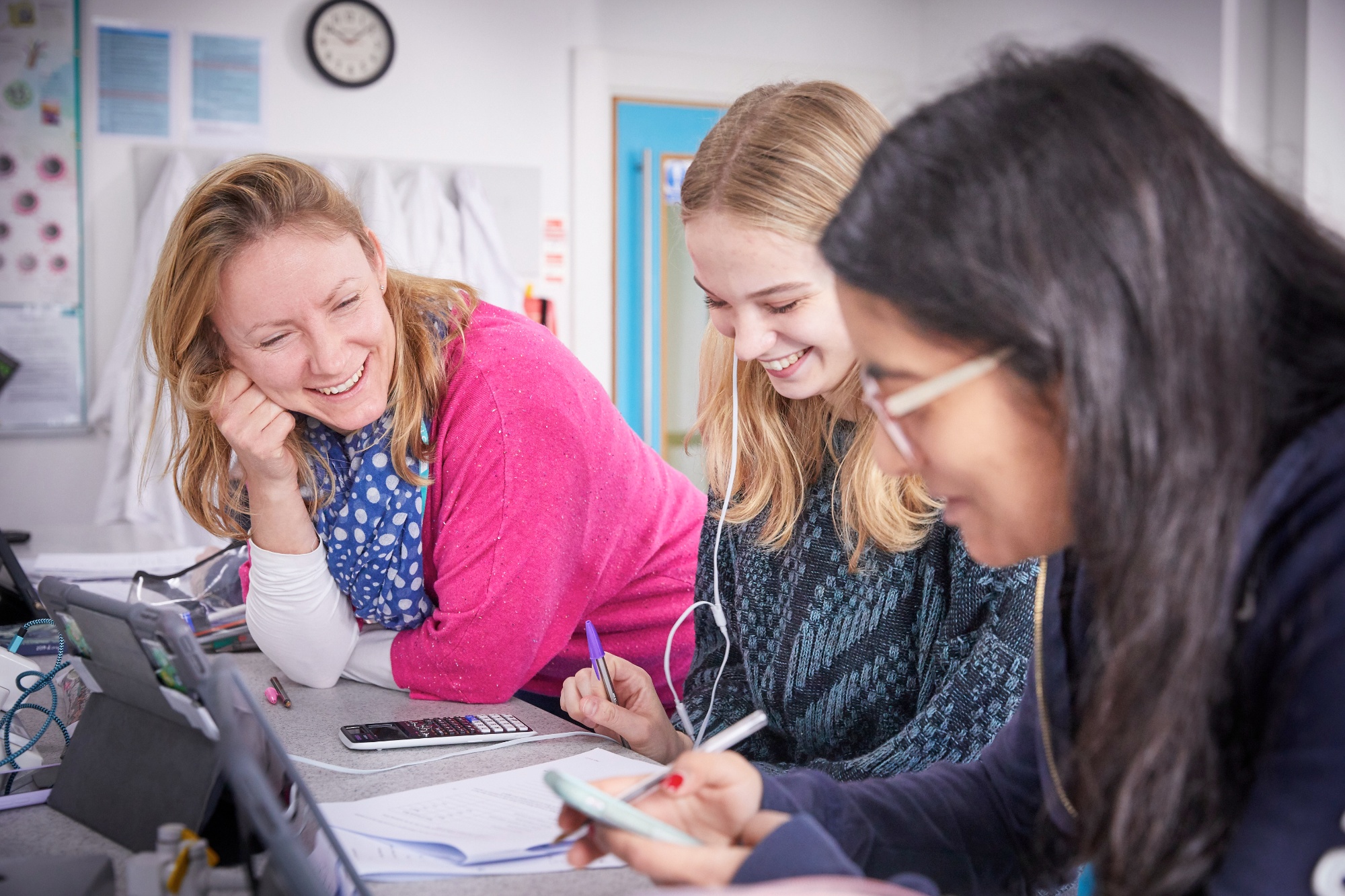 Sixth form students with teacher
