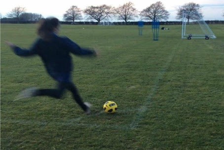 Student playing football