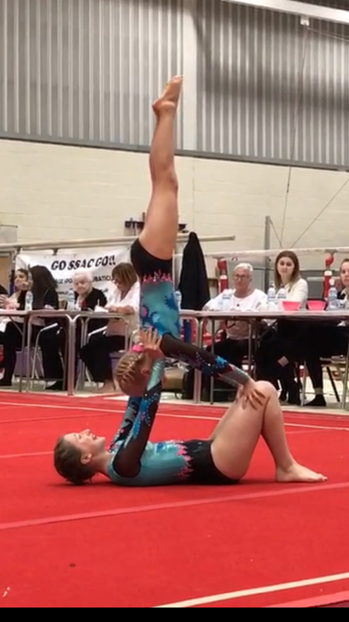 Vivien competing at acrobatics competition