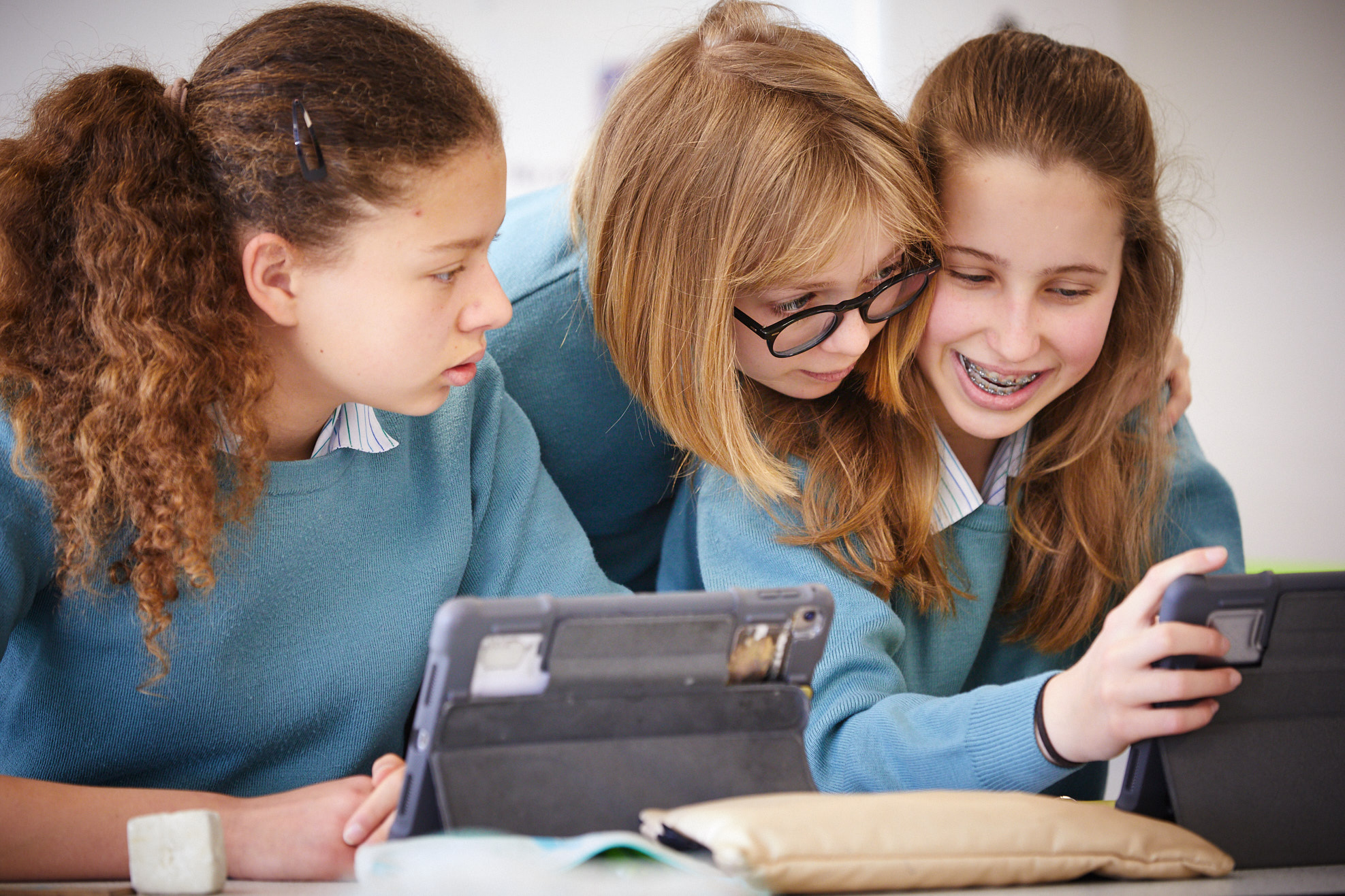 Image of students in classroom with ipads to illustrate link to 'School Calendar' page