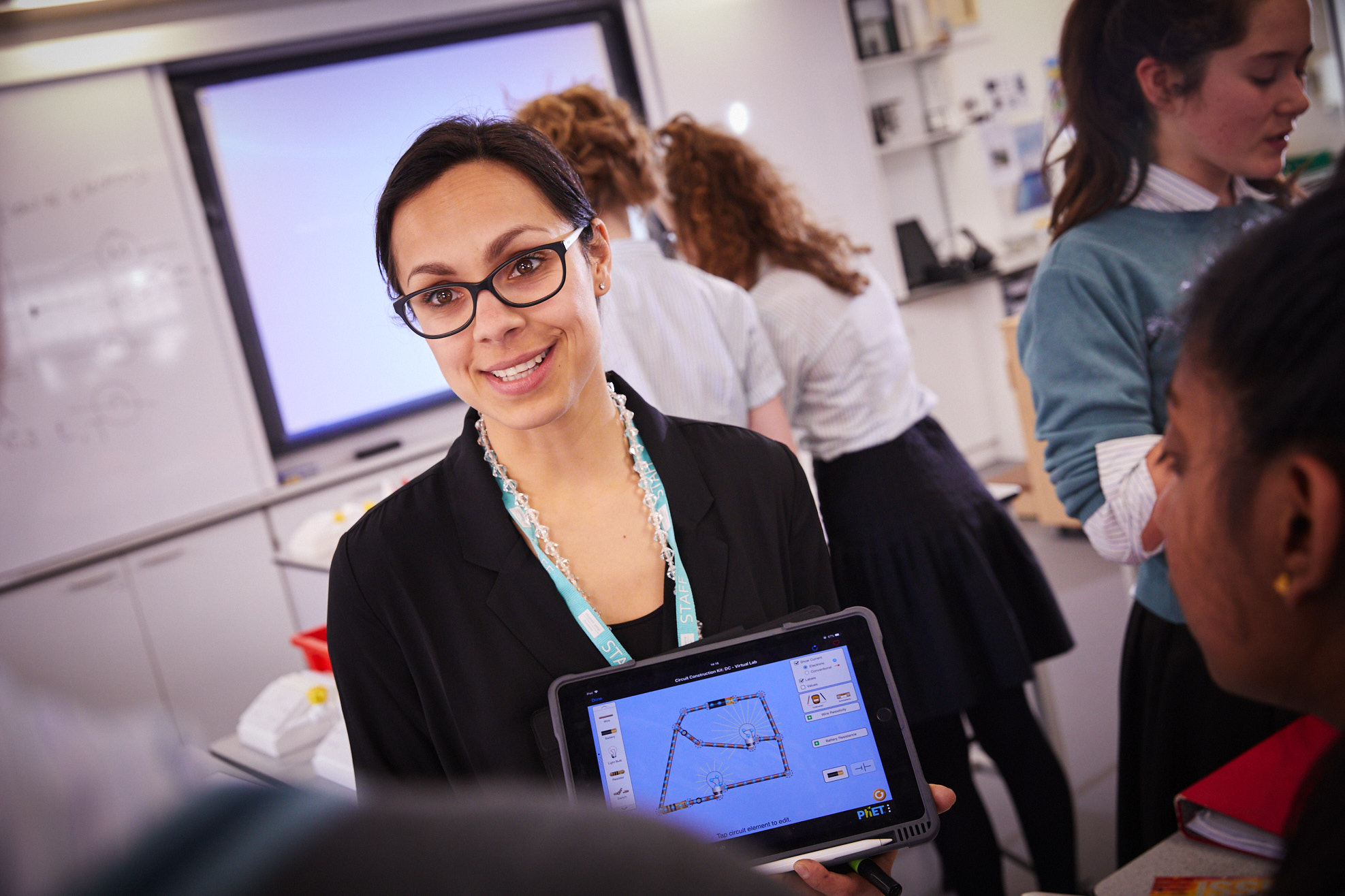 Image of staff member to illustrate link to 'Visit us' page