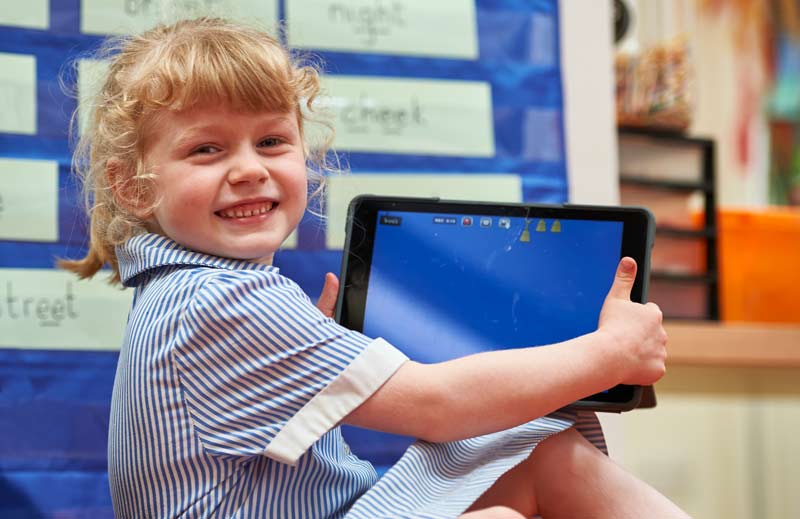 Student with iPad