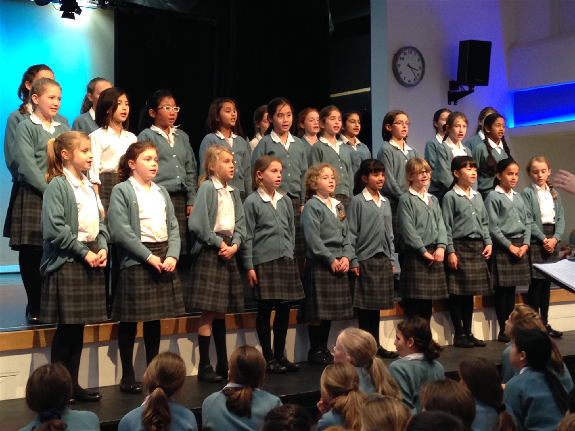 Image of pupils singing to illustrate link to 'Music' page