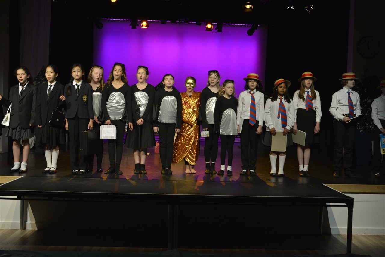 Image of pupils doing drama performance to illustrate 'Perform!' page