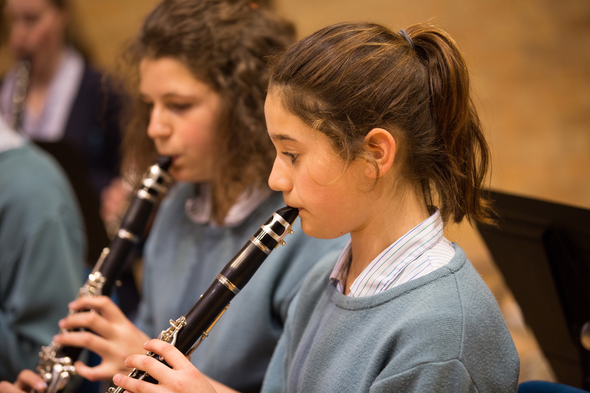 Image of students playing the clarinet to illustrate link to 'Music IGCSE'