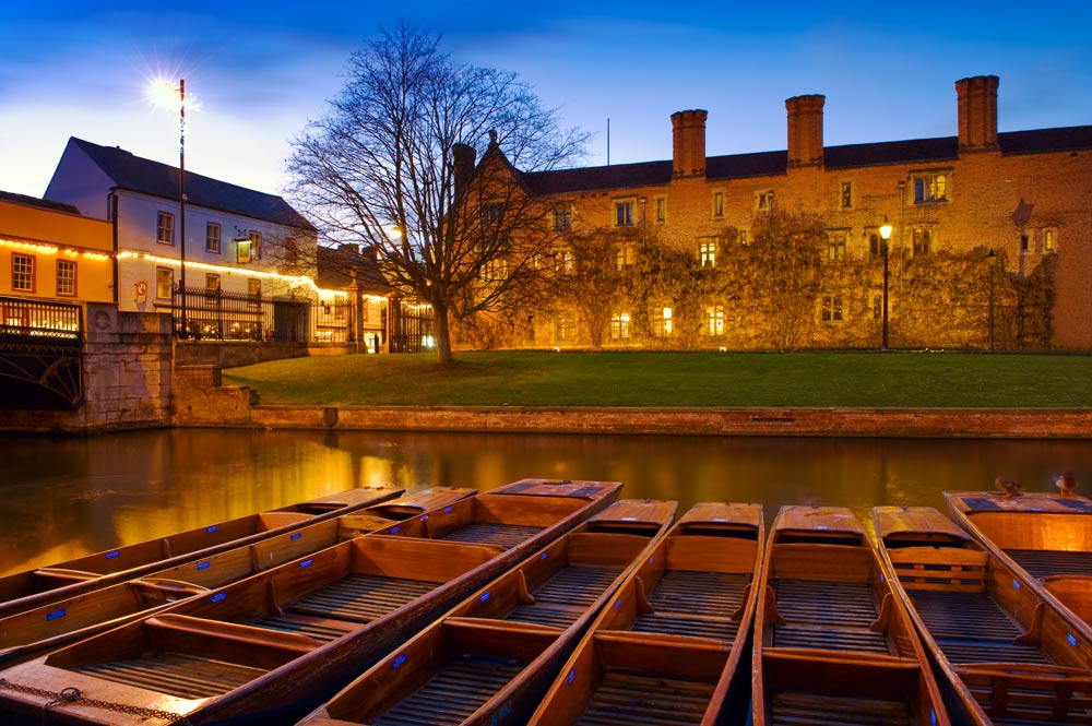 Beautiful night shot of boating punts on the river Cam in Cambridge