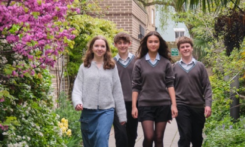 Four Stephen Perse Cambridge students walking on campus