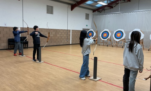 Stephen Pers Cambridge Sixth Form boarding students day trip to Grafham Water where they tried Archery